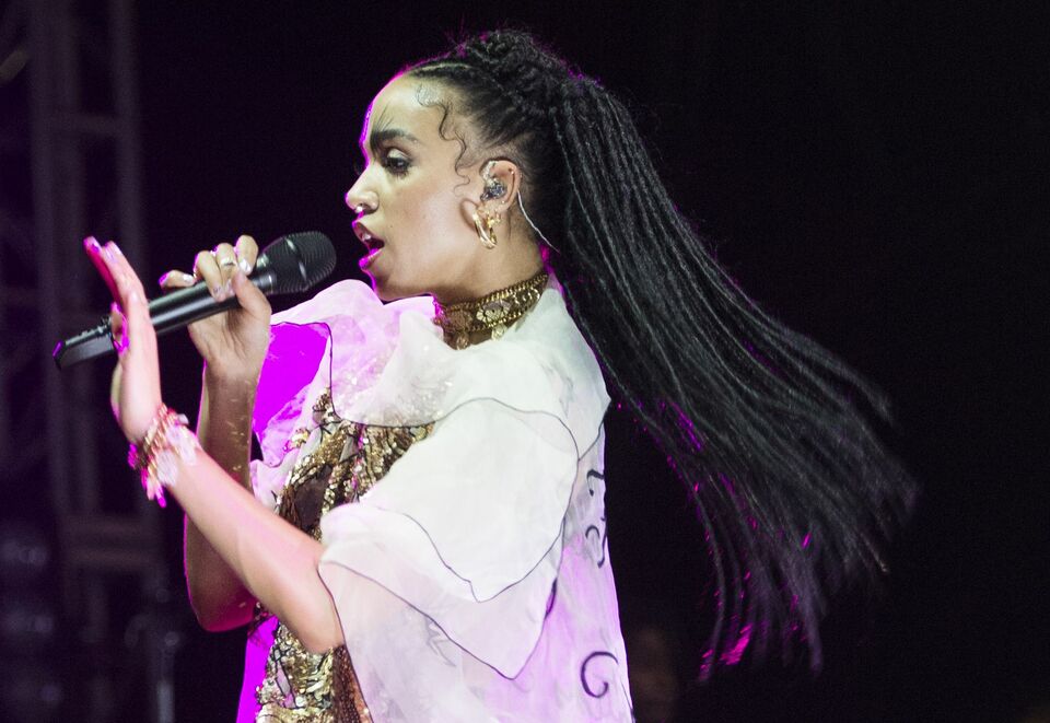 FKA Twigs performs on the second day of the Coachella Music Festival in Indio, California, on April 11, 2015. (AFP Photo/Robyn Beck)
