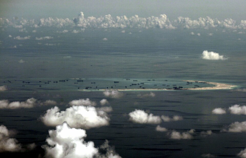 The Philippines on Monday urged China, as a responsible member of the international community, to respect a forthcoming ruling by an arbitration court in the Hague on a territorial dispute in the South China Sea. (Reuters Photo/Ritchie B. Tongo)