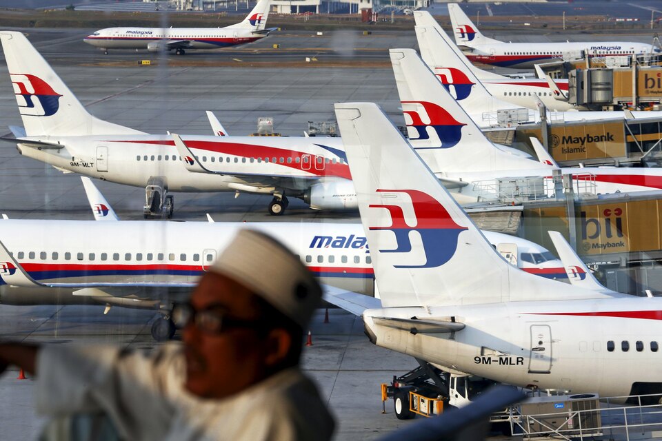Malaysia Airlines planes are seen on the tarmac at the Kuala Lumpur International Airport.  (Reuters Photo/Damir Sagolj)