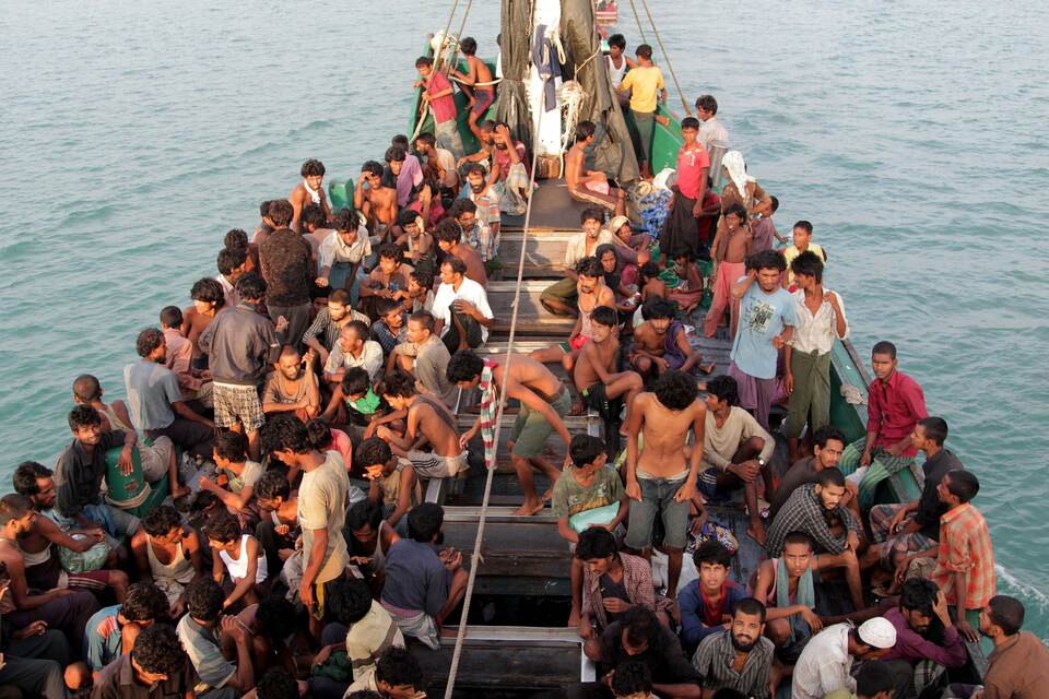 Myanmar claimed its navy discovered a boat carrying more than 200 Bangladeshi refugees drifting off its shores. Subsequent interview by Reuters news service have found that they were Rohingya. (AFP Photo/Januar)