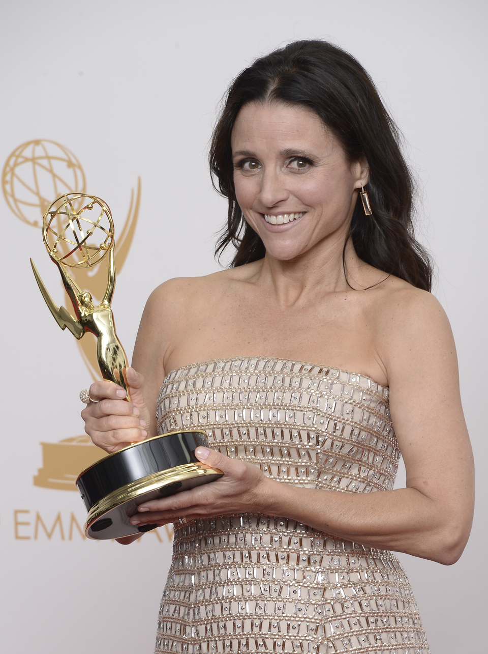 US actress Julia Louis-Dreyfus poses with her award for Outstanding Lead Actress in a Comedy Series in 'Veep' during the 65th Primetime Emmy Awards in 2013. (EPA Photo/Paul Buck)