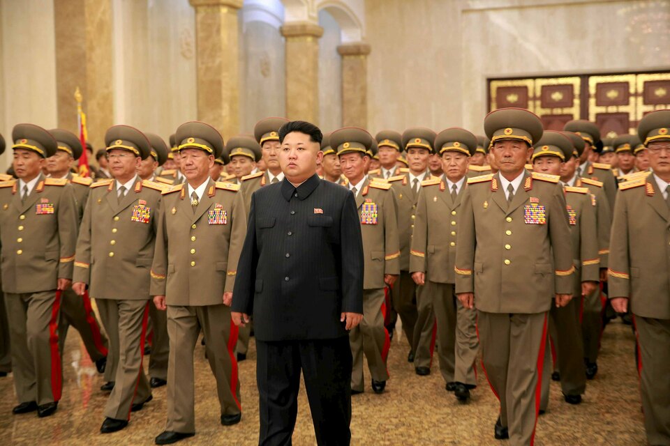 North Korean leader Kim Jong-un visits the Kumsusan Palace of the Sun where the statues of President Kim Il-sung and leader Kim Jong-il are standing during the 62nd anniversary of the end of the Korean War in this undated photo released by North Korea's Korean Central News Agency (KCNA) in Pyongyang on July 27. (Reuters Photo/KCNA)