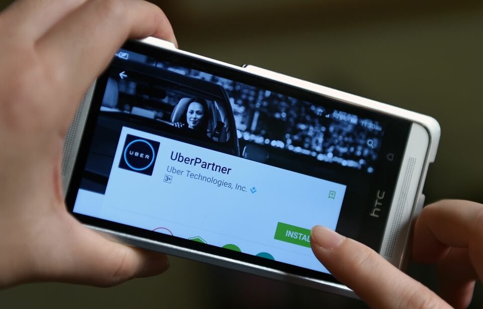 Transportation app Uber says it is now allowed to operate in Jakarta. (AFP Photo/Sam Yeh)