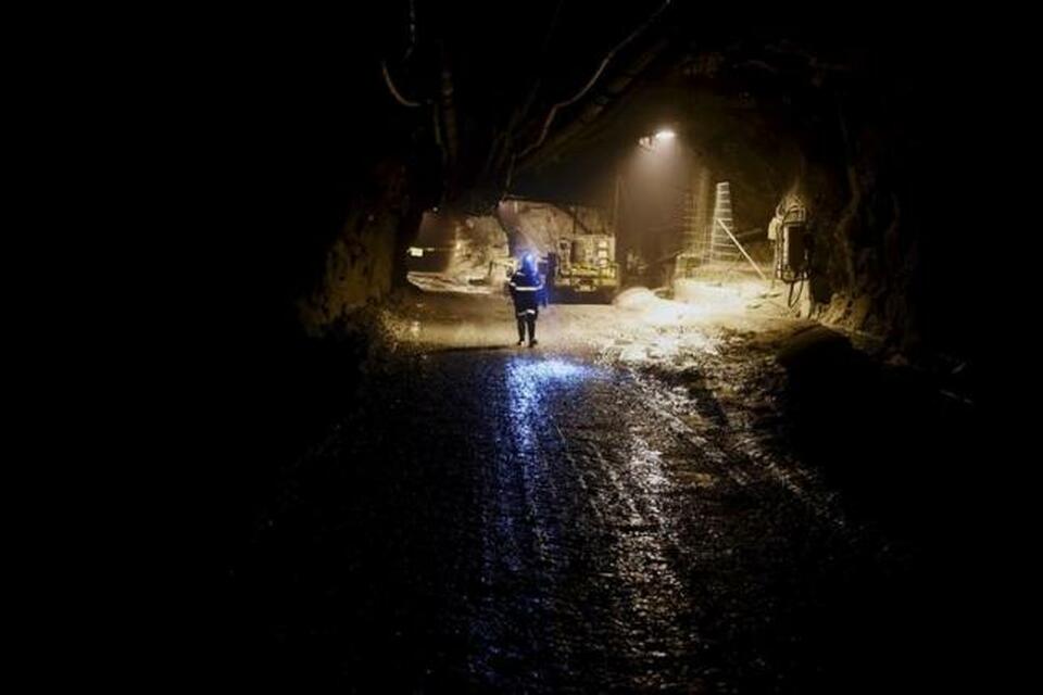 A worker walks in an underground mine, part of the Grasberg copper and gold mine operated by Freeport Indonesia, the local unit of Freeport-McMoRan, near Timika in Papua. (Antara Photo/M. Agung Rajasa)