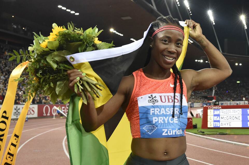 Jamaica's Shelly-Ann Fraser-Pryce celebrates after winning the women's 100m race during the Diamond League Athletics Weltklasse meeting in Zurich on September 3, 2015. (AFP Photo/Michael Buholzer)