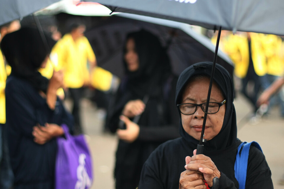 Human right activists at a "Kamisan" rally in front of the State Palace in Jakarta, last year. (JG Photo/Afriadi Hikmal)