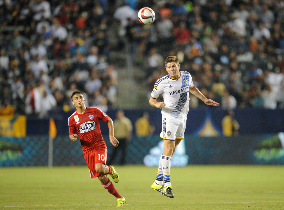 Los Angeles Galaxy midfielder Steven Gerrard (8) heads the ball against FC Dallas during the second half at StubHub Center. (Gary A. Vasquez-USA TODAY Sports)