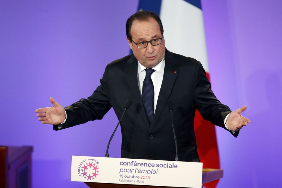 French President Francois Hollande said on Friday that he would host his Iranian counterpart Hassan Rouhani at the end of January after an earlier visit was postponed. (Reuters Photo/Charles Platiau)