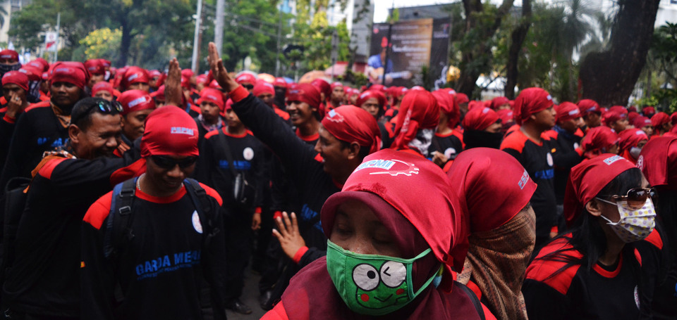 A legal aid group will gather international support to demand that law enforcers halt the "criminalization" of 26 people who were arrested during a labor protest in Jakarta last year, the group