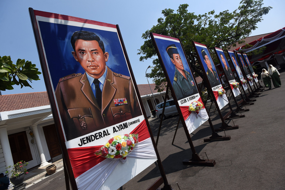 Posters of military leaders who were murdered in an alleged coup attempt on Sept. 30, 1965, seen in Surabaya on Wednesday, ahead of Pancasila Sanctity Day celebrations. (Antara Photo/Zabur Karuru)
