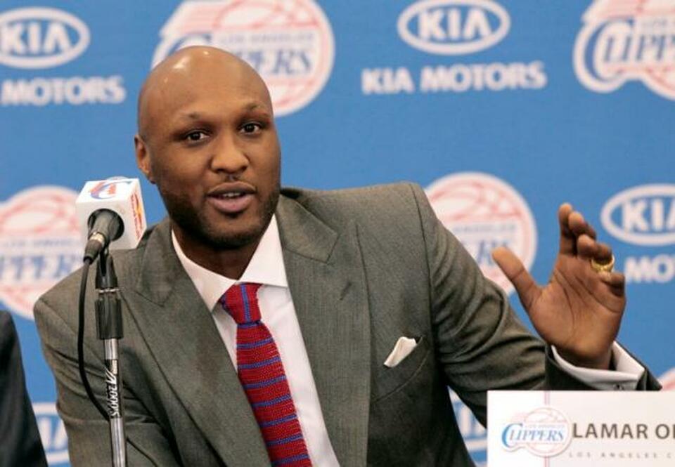 Basketball player Lamar Odom speaks at a news conference announcing his acquisition by the Los Angeles Clippers in Los Angeles, California in this July 2, 2012 file photo. (Reuters Photo/Mario Anzuoni/Files)