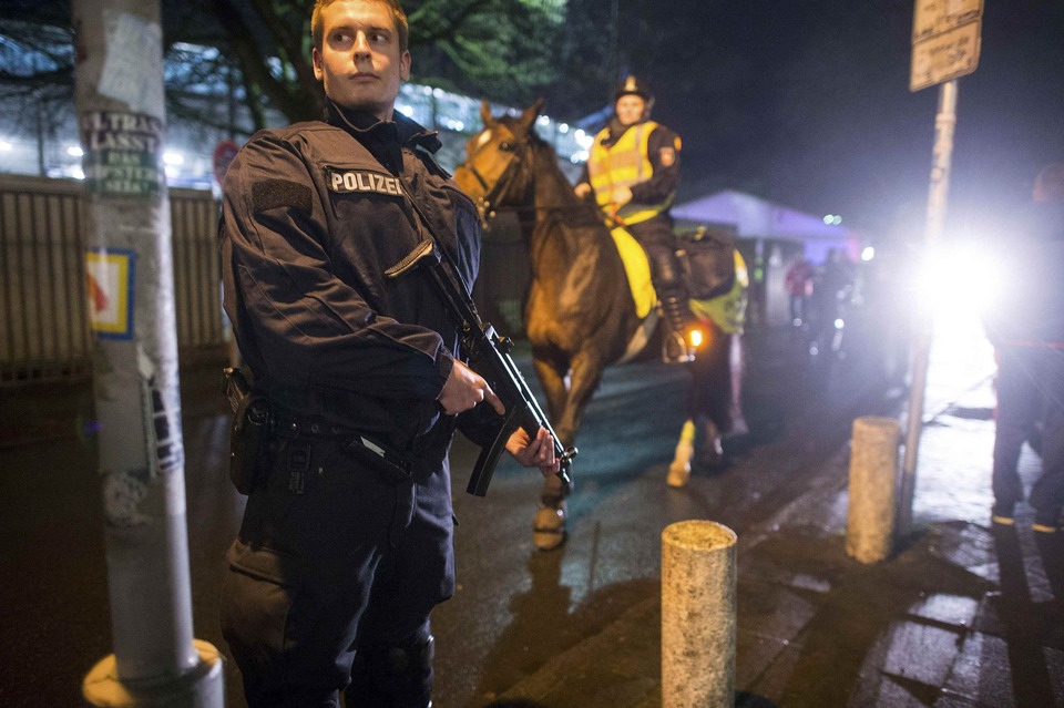 Police outside the stadium following the cancellation of the Germany-Netherlands international friendly soccer match due to a security threat, in Hanover, Germany, on Nov. 17. (Reuters Photo/Morris MacMatzen)