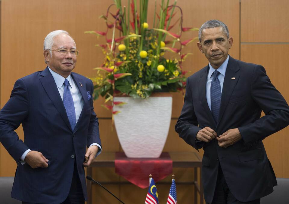 Malaysian Prime Minister Najib Razak and US President Barack Obama at the Kuala Lumpur Convention Center prior to the start of the Asean Summit on Friday. US President Barack Obama said he would raise democracy and free-speech concerns with Malaysia’s leader as he seeks to strike a balance with a country Washington is courting as a regional ally. (AFP Photo/Saul Loeb)