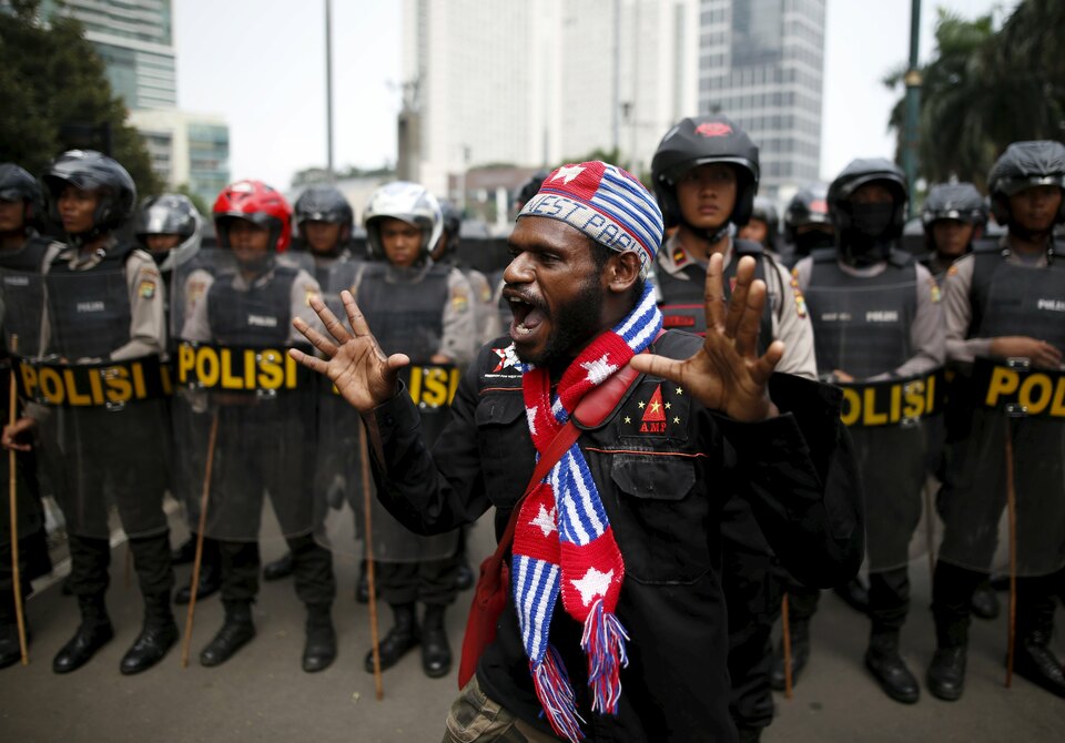 An activist shouts near a police line during a rally to commemorate a Papuan declaration of independence from Dutch rule, in Jakarta in December. (Reuters Photo/Darren Whiteside)