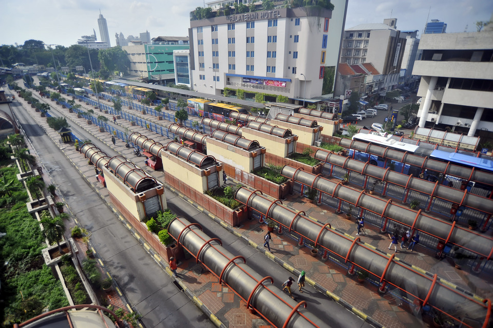 Blok M Terminal in South Jakarta, usually a hive of orange and blue, appears deserted on Saturday following a citywide crackdown on MetroMini buses. (Antara Photo/Yudhi Mahatma)