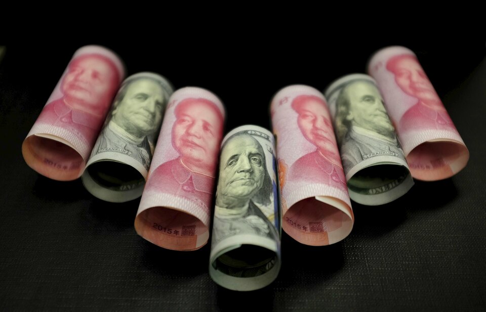 Financial markets need more clarity on how Chinese authorities are managing their currency, particularly the relationship of the yuan to the U.S. dollar, IMF Managing Director Christine Lagarde said. (Reuters Photo/Jason Lee)