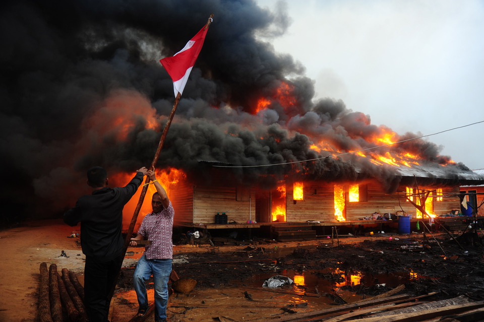Gafatar's West Kalimantan village was razed in January by a local mob. (Antara Photo/Jessica Helena Wuysang)