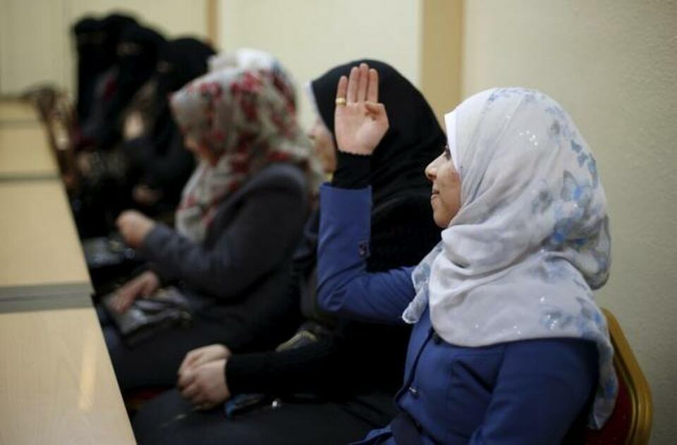 Palestinian brides attend marriage counseling class at the Islamic University in Gaza City January 19, 2016.  (Reuters Photo/Suhaib Salem)