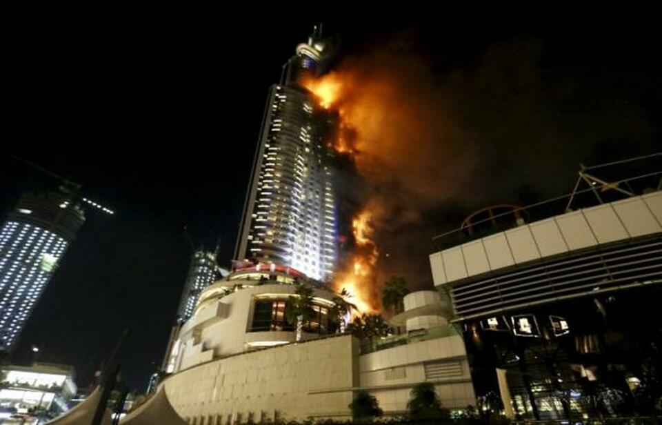 A fire engulfs the Address Hotel in downtown Dubai in the United Arab Emirates in this December 31, 2015 file photo. (Reuters Photo/Ahmed Jadallah/Files)