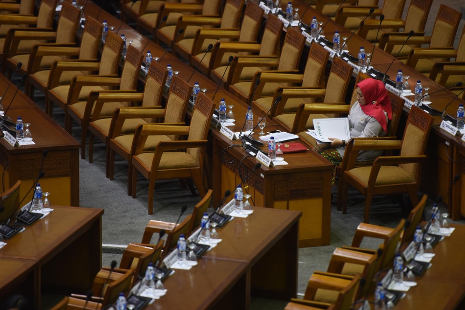 Seats remain empty during a plenary session at the House of Representatives. (Antara Photo/Akbar Nugroho Gumay)