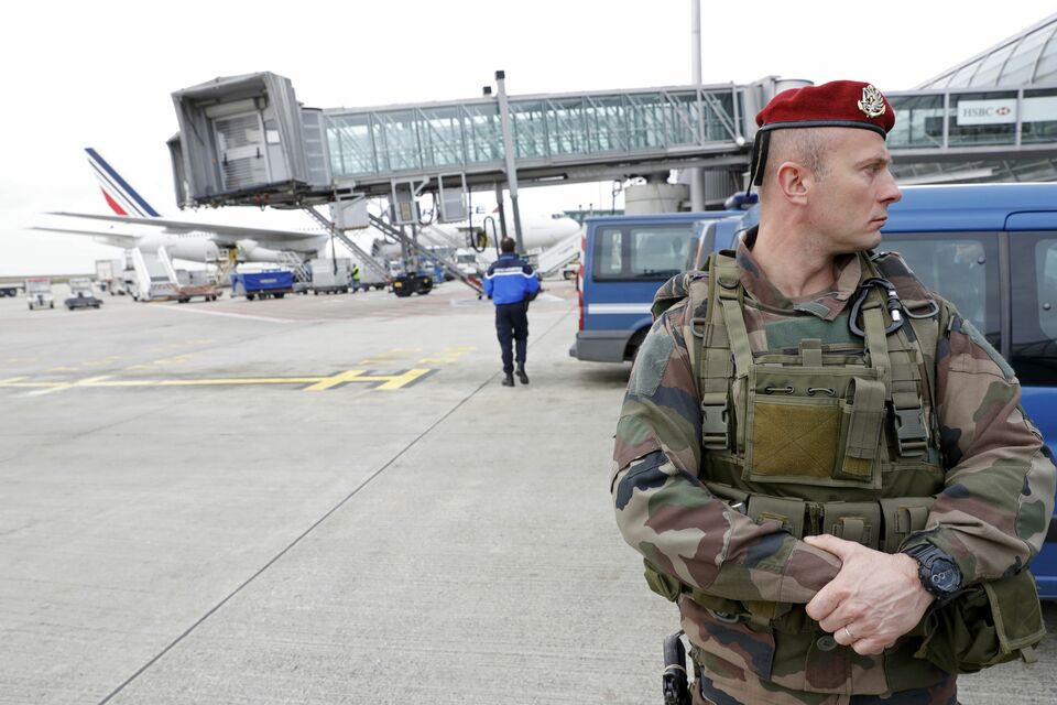 Several countries have tightened or reviewed airport security following twin explosions at Brussels Airport, as Australian Prime Minister Malcolm Turnbull on Wednesday blamed Europe's porous borders and lax security for the attack. (Reuters Photo/Phillippe Wojazer)