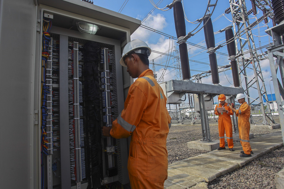 State utility company Perusahaan Listrik Negara plans to offer an asset-backed collective investment contract, or KIK-EBA, to investors in August, seeking to raise Rp 10 trillion ($301.11 million) for financing Indonesia's power development. (Antara Photo/Muhamad Adimaja)