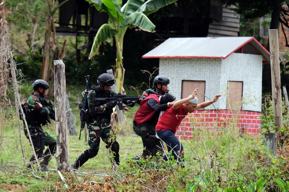 Under President Joko Widodo, the military has joined the nation’s fight against drugs, terrorism and corruption, areas previously reserved for the police. (Antara Photo/Fadlansyah) 