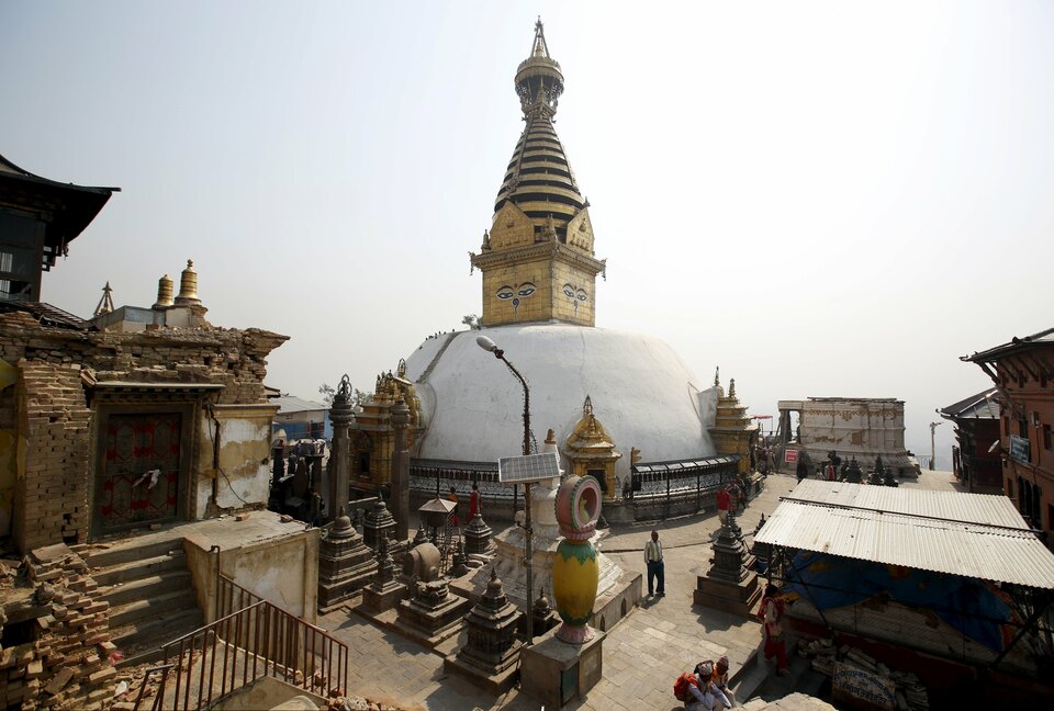 Collapsed monastery and shrines are pictured at the Swoyambhunath Stupa, a UNESCO world heritage site a year after the 2015 earthquakes in Kathmandu, Nepal, April 25, 2016.  (Reuters Photo/Navesh Chitrakar)