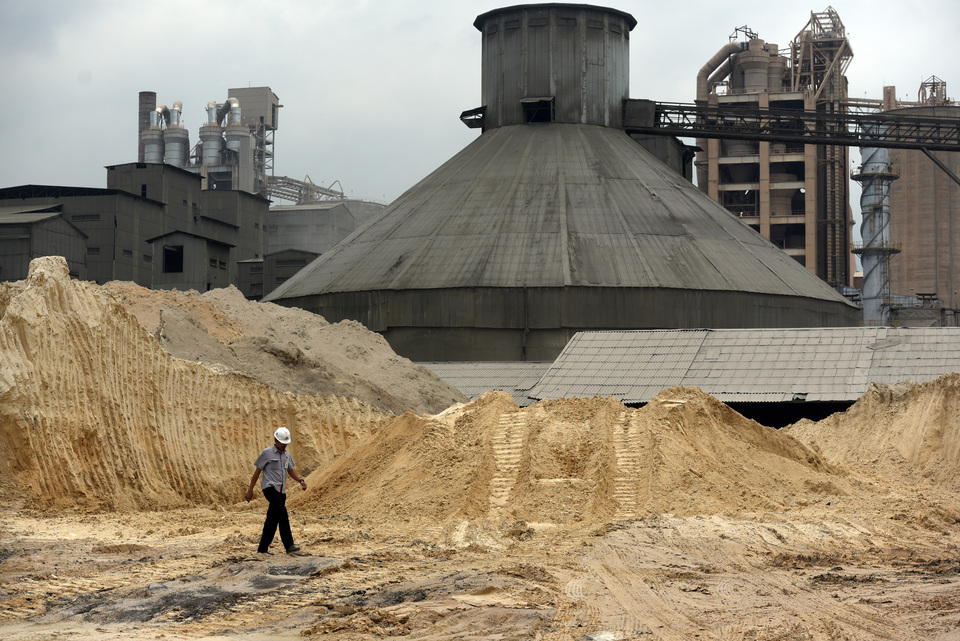 Newly opened cement plants in Indonesia, like this one at Semen Gresik, risk being underused as cement sales in September fell due to lower demand from the housing industry. (Antara Photo/Zabur Karuru)