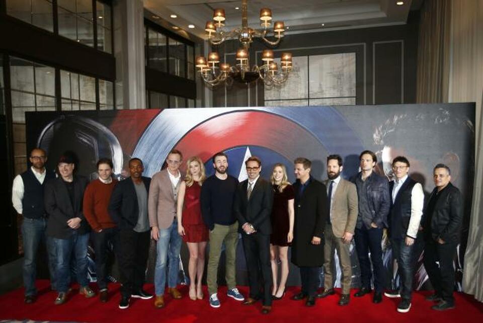 Cast and crew members of the film pose for photographers at a media event ahead of the release of, "Captain America: Civil War," in London, Britain, April 25, 2016. (Reuters Photo/Peter Nicholls)