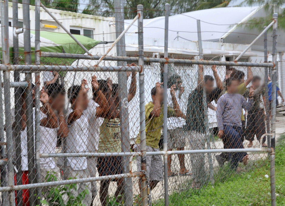 Asylum seekers at the Manus Island detention center in Papua New Guinea on March 21, 2014. (Reuters Photo/Eoin Blackwell)