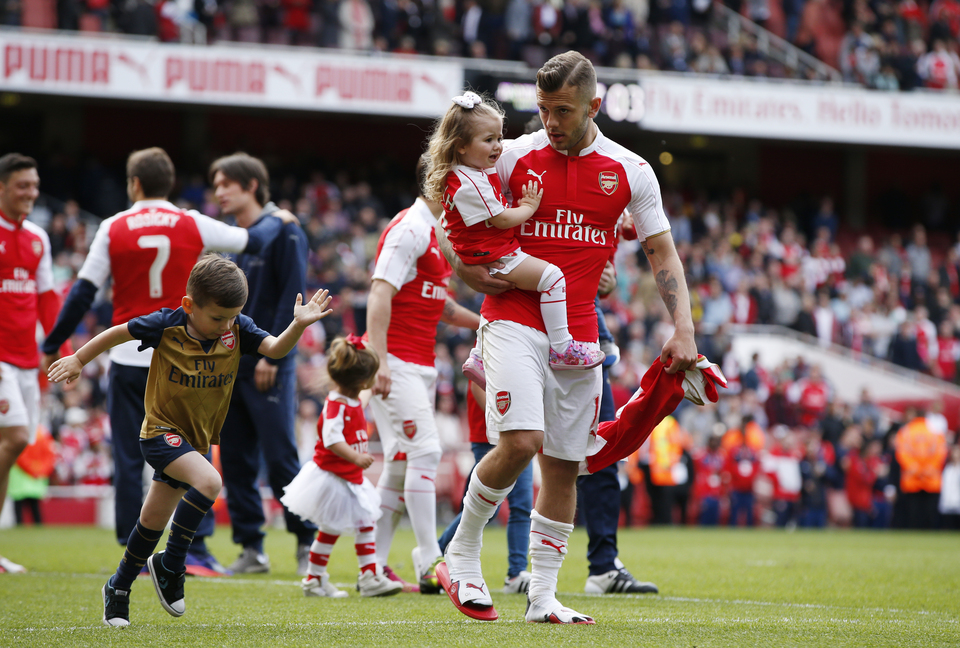 Arsenal's Jack Wilshere during the lap of honor at the end of the match between Arsenal and Aston Villa. (Reuters Photo/John Sibley)
