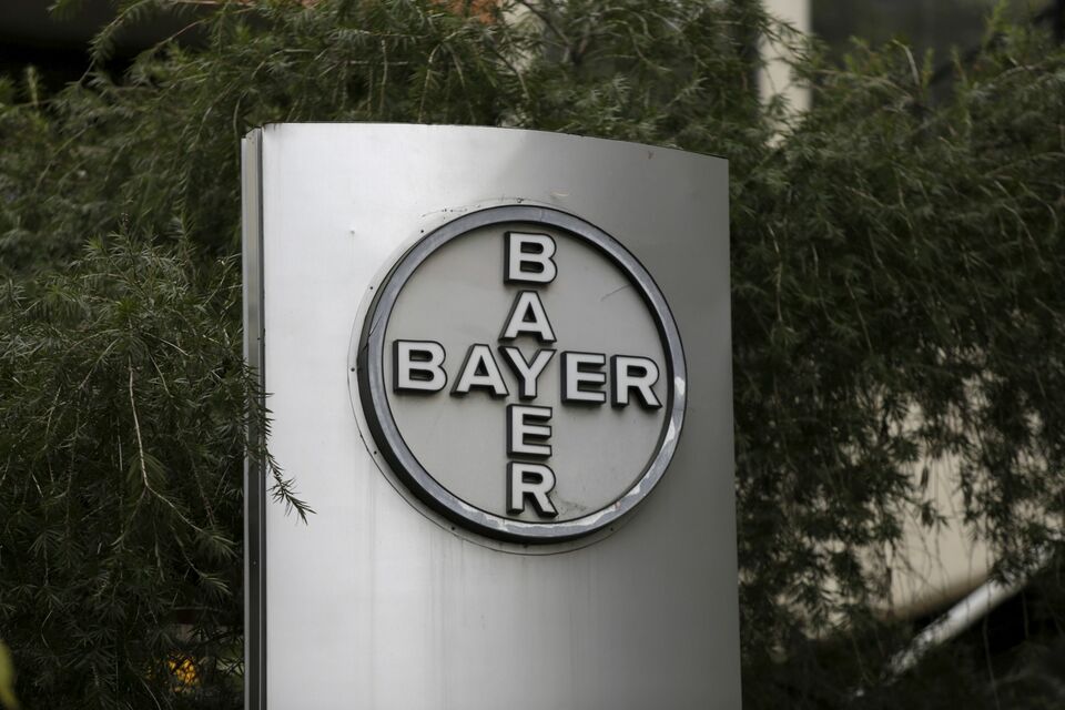The corporate logo of Bayer is seen at the headquarters building in Caracas. (Reuters Photo/Marco Bello)