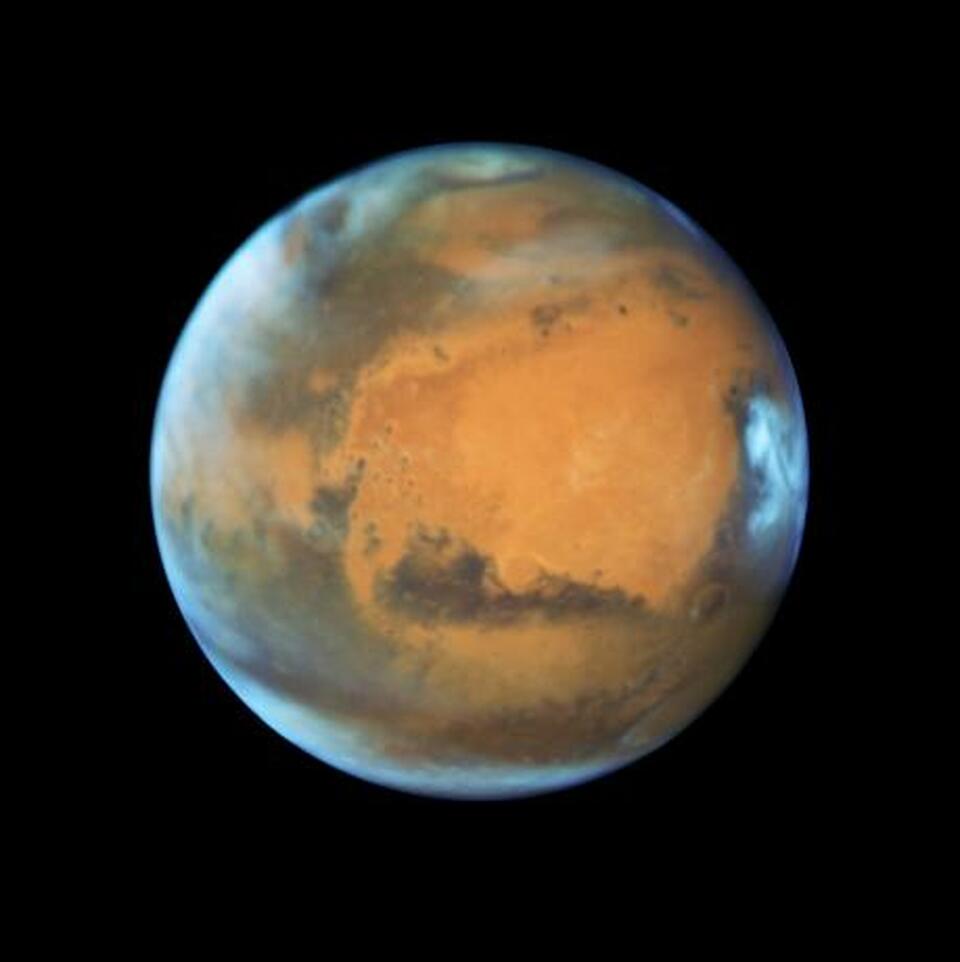 The planet Mars is shown May 12, 2016 in this NASA Hubble Space Telescope view taken May 12, 2016 when it was 50 million miles from Earth. Earth's neighbor planet makes its closest approach in a decade this month, providing sky-watchers with a celestial show from dusk to dawn. (NASA Handout)