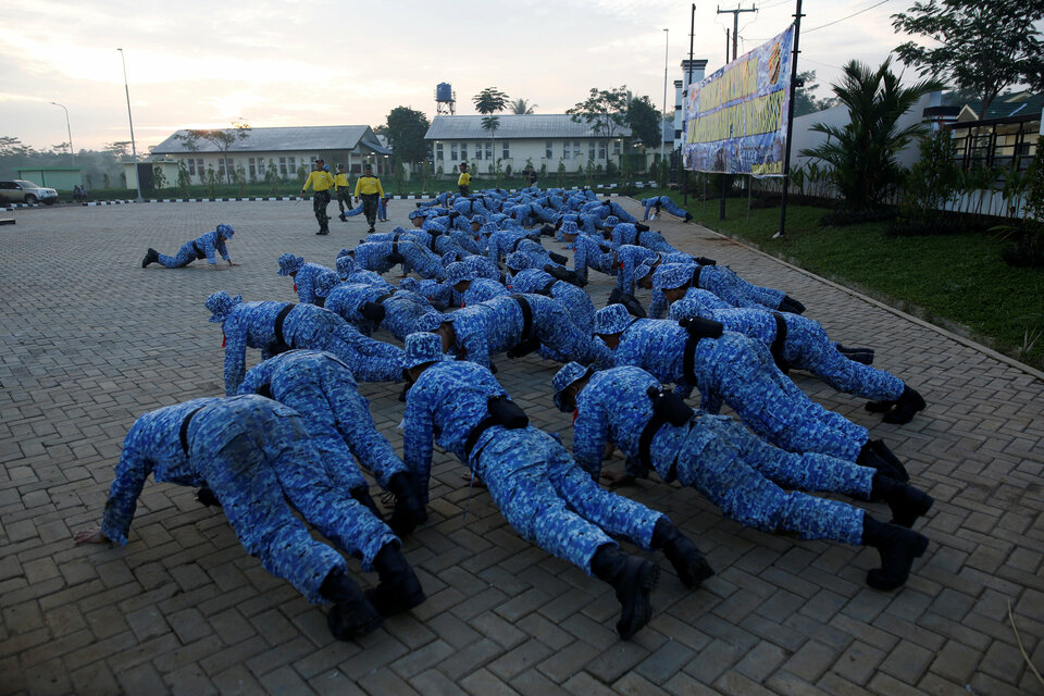 'Bela Negara' participants going through their drill. (Reuters Photo/Darren Whiteside)