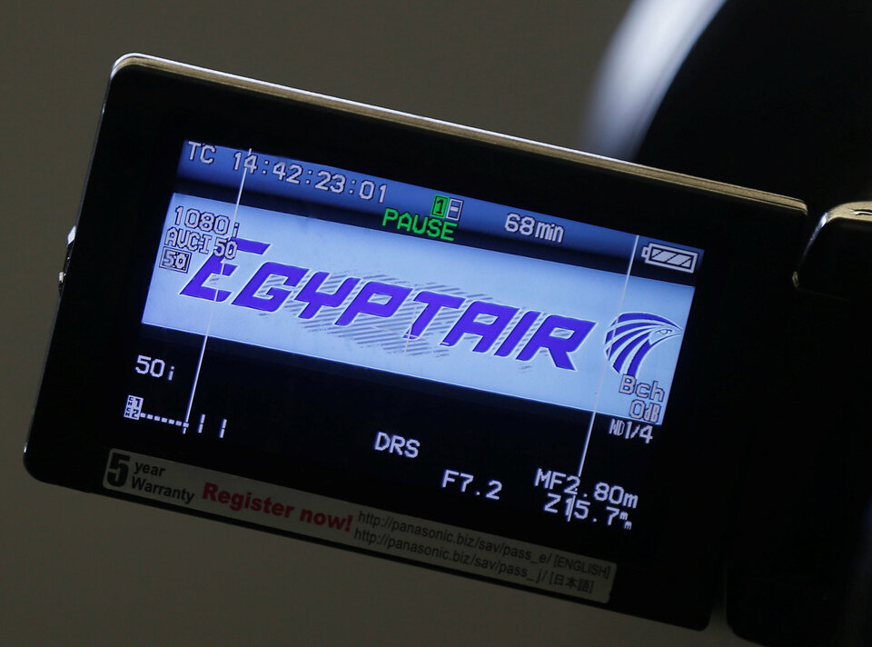 The company logo is displayed on a video camera screen at the Egyptair desk at Charles de Gaulle airport, after an Egyptair flight disappeared from radar during its flight from Paris to Cairo, in Paris, France, May 19, 2016. (Reuters Photo/Christian Hartmann)