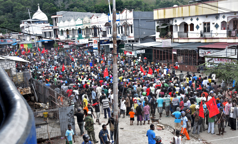 This photo illustration shows a demonstration in Jayapura, Papua, in May 2016. Reports of human rights abuses often emerge from Indonesia's easternmost province, where a separatist movement has simmered for decades. (Antara Photo/Indrayadi T.H.)