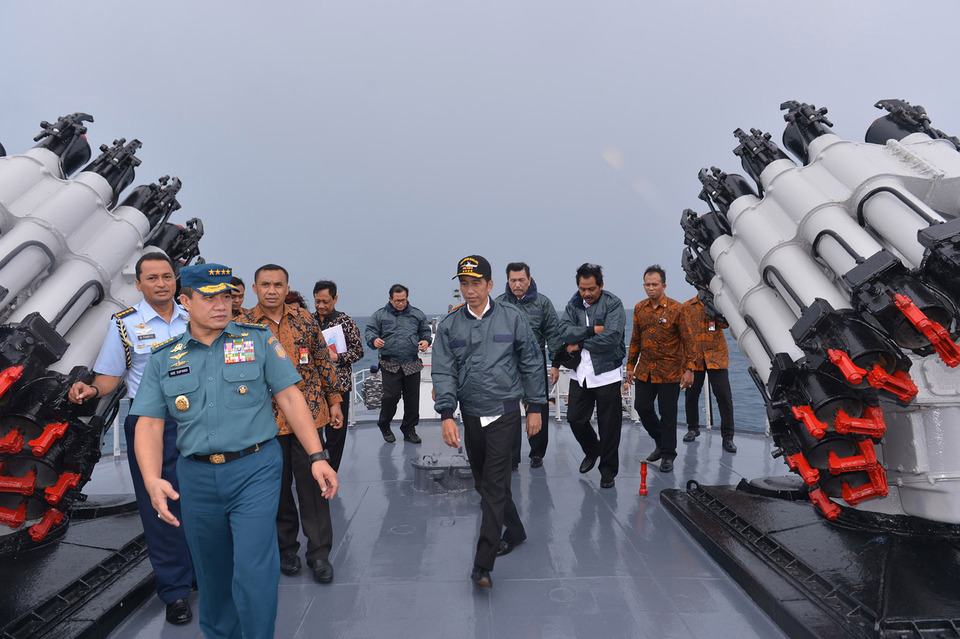 President Joko Widodo on board the Indonesian Navy warship Imam Bonjol near the Natuna Islands on June 23. (Antara Photo/Setpres-Krishadiyanto)