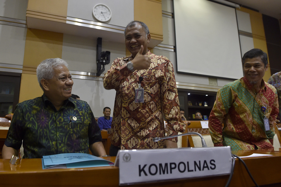 KPK chief Agus Rahardjo, center, after the hearing. (Antara Photo/Puspa Perwitasari)