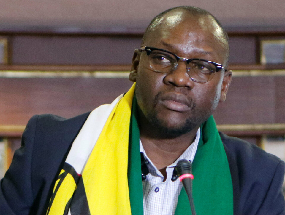 Pastor Evan Mawarire, who launched the movement #ThisFlag, to get Zimbabweans to rally round the national flag and speak out against Mugabe policies, is seen at a press conference in Harare, Zimbabwe. (Reuters Photo/Philimon Bulawayo)