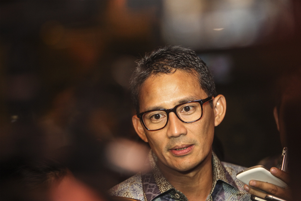 Sandiaga Uno — Anies Baswedan's running mate in the Jakarta gubernatorial election — has requested that his meeting with the Jakarta Police to explain his involvement in an embezzlement case be rescheduled until after the second round of the Jakarta gubernatorial election on April 19. (Antara Photo/Muhammad Adimadja)