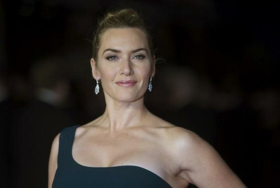 Cast member Kate Winslet poses for photographers at the closing night premiere of the film  "Steve Jobs" at the BFI London Film Festival October 18, 2015. (Reuters Photo/Neil Hall)