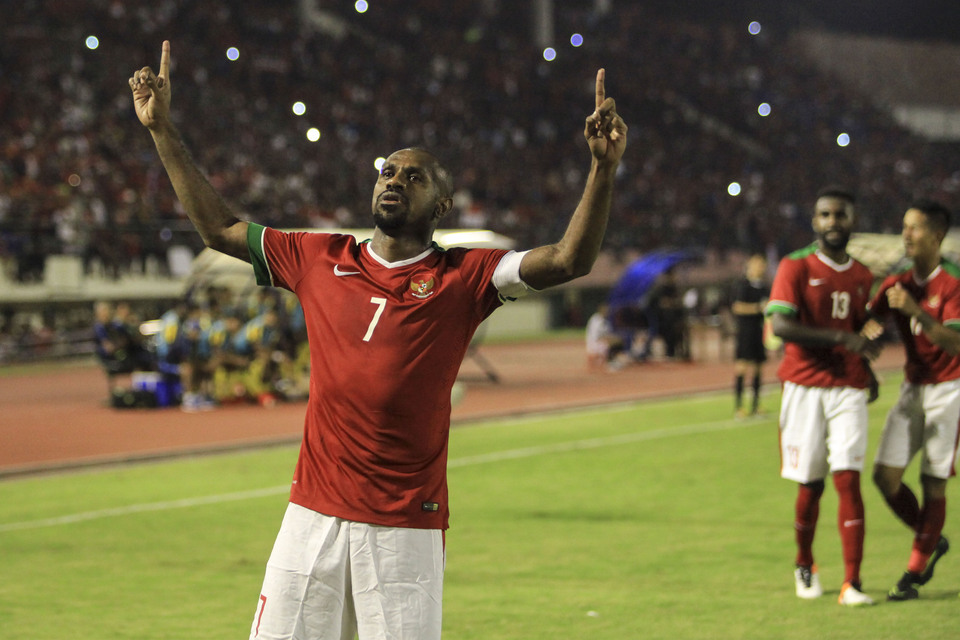 Papuan striker Boaz Salossa celebrates his goal at Manahan Stadium, Solo, Tuesday night (06/09). (Antara Photo/Maulana Surya)