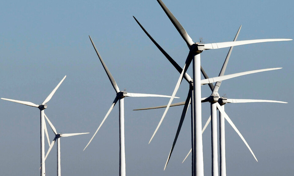 Wind farm operators are betting on a new generation of colossal turbines, which will dwarf many skyscrapers, as they seek to remain profitable after European countries phase out subsidies that have defined the green industry since the 1990s. (Reuters Photo/Regis Duvignau)