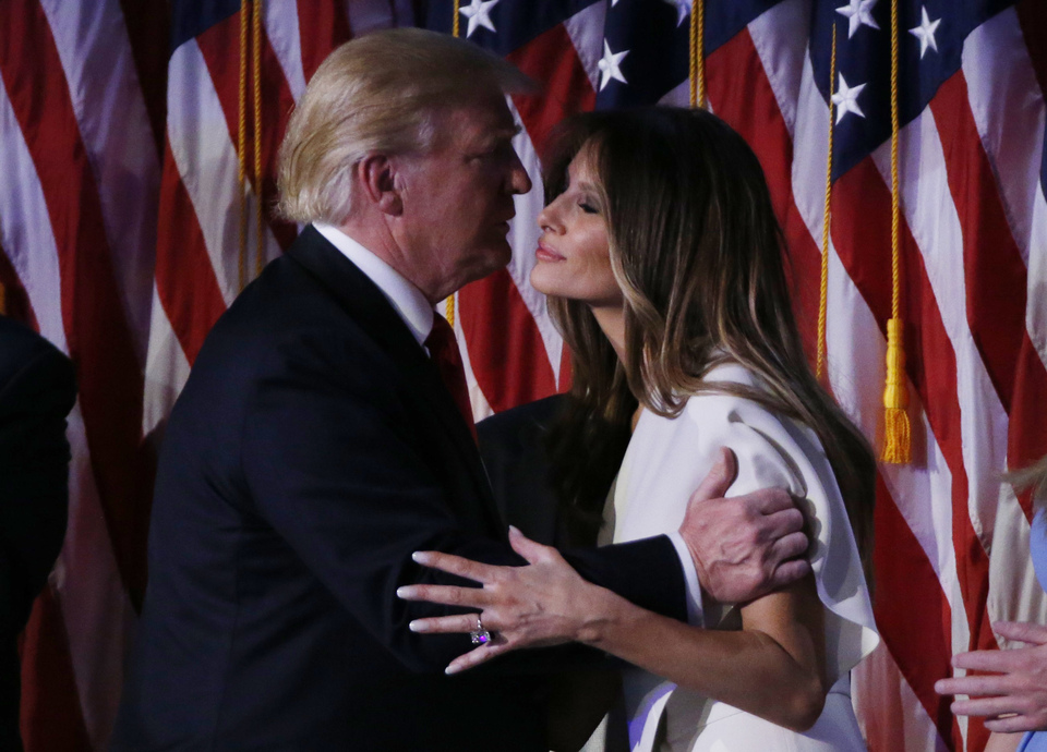 Donald Trump kisses his wife Melania at his election night rally in Manhattan. (Reuters Photo/Jonathan Ernst)