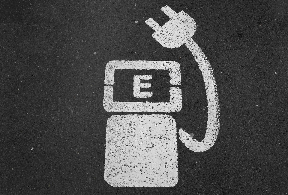 A battery charger sign for electric cars. (Reuters Photo/Kai Pfaffenbach)