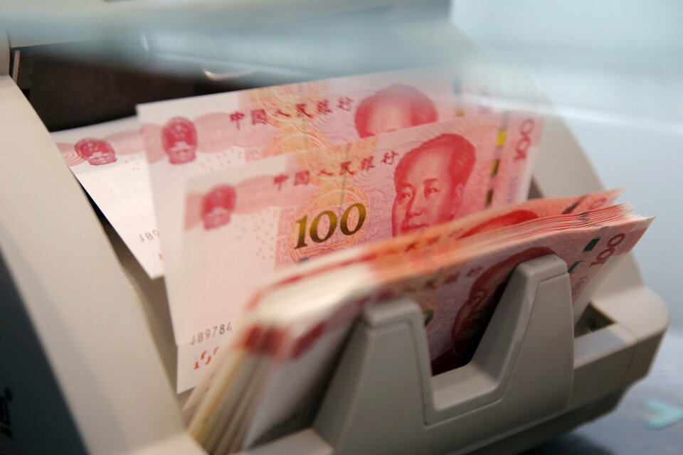 China's structural reforms will slow the pace of its debt build-up but will not be enough to arrest it, and another credit rating cut for the country is possible down the road unless it gets its ballooning credit in check, officials at Moody's said.(Reuters Photo/Kim Kyung-Hoon)