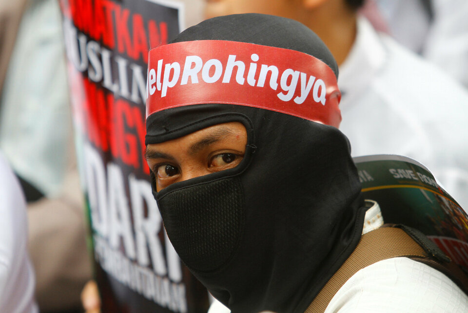 A protesters wears a headband with 'Help Rohingya' on it during a  demonstration against what organizers say is the crackdown on ethnic Rohingya Muslims in Myanmar, outside the Myanmar Embassy in Jakarta in November.(Reuters Photo/Iqro Rinaldi)