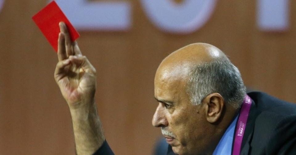 Palestinian Football Association, or PFA, president Jibril Al Rajoub shows a red card during FIFA congress in 2015. (Reuters Photo/Ruben Sprich)