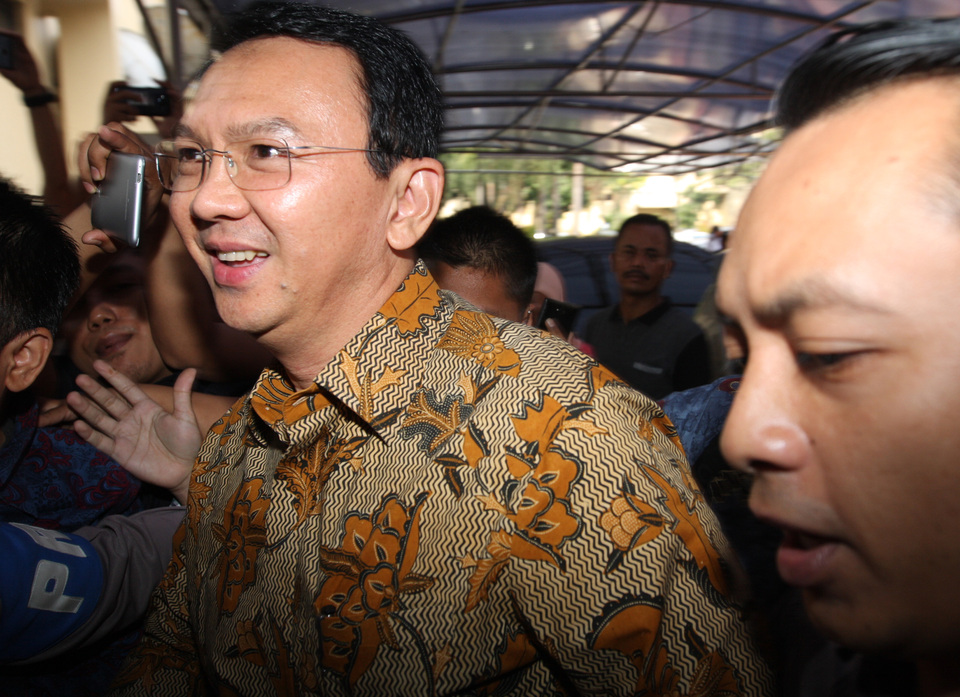Jakarta Governor Basuki 'Ahok' Tjahaja Purnama has expressed satisfaction with news that the case file related to blasphemy allegations against him had been submitted to the Attorney General's Office. (Antara Photo/Reno Esnir)